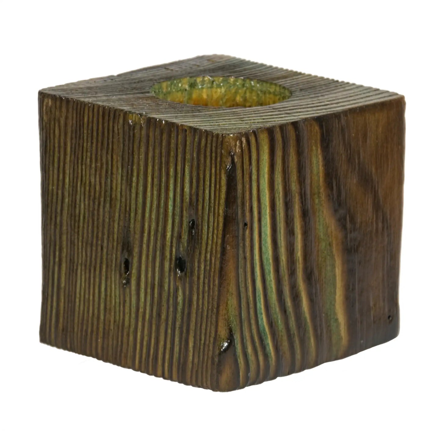 A handcrafted wooden fence post tealight holder, 70mm high and finished in a menthol colour. Shown on a white background.