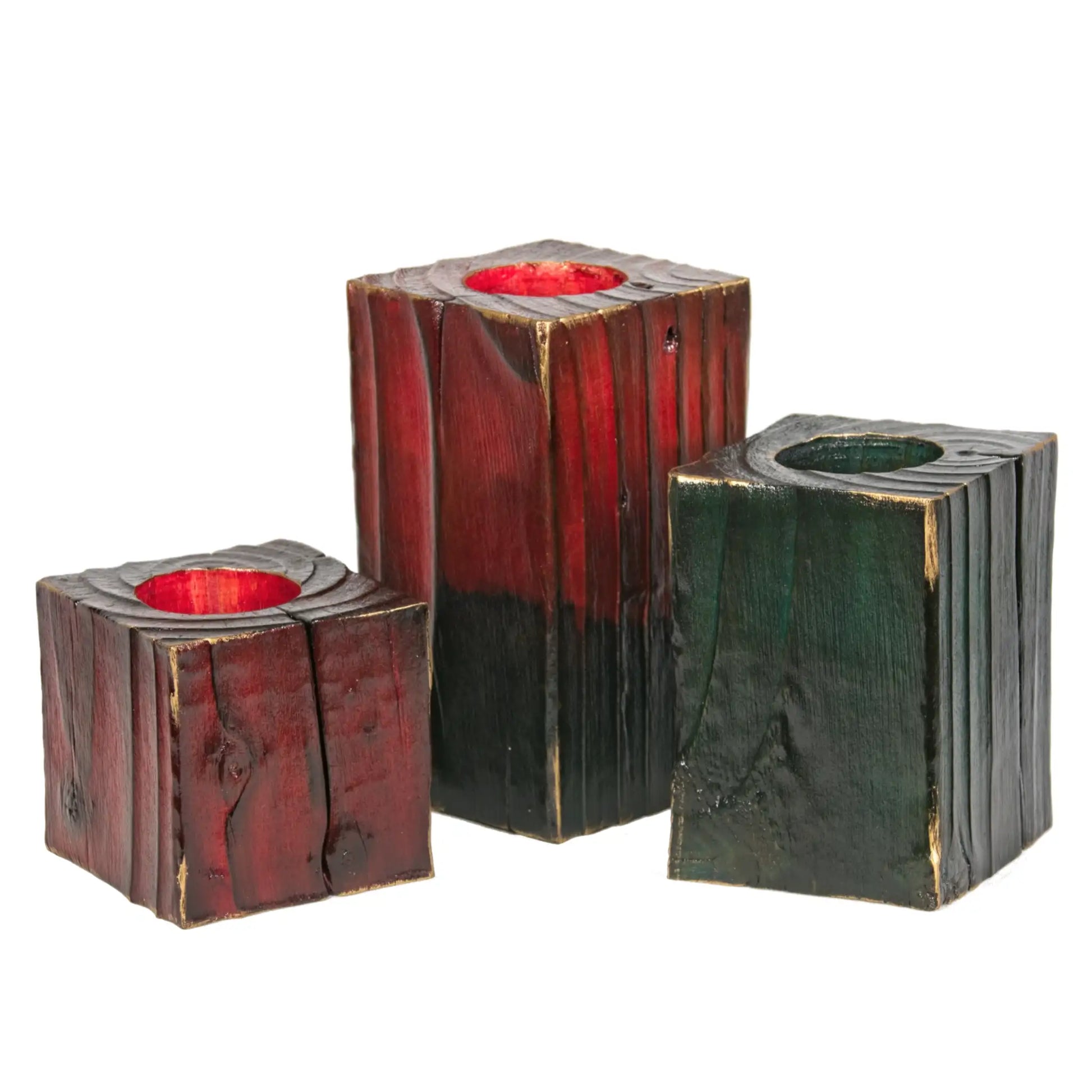 A set of 3 wooden Christmas tealight holders of different sizes. The largest has a red top. Shown on a white background.