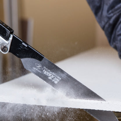 Image showing a close-up of the Zetsaw V Handy200 Board Anahiki-nokogiri Japanese Saw cutting drywall and plasterboard.